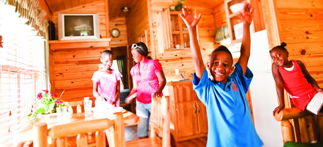 Photo of Family in a Deluxe Cabin